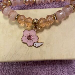 Children’s beaded bracelet approximately 3”, pink